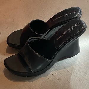 Black leather slides